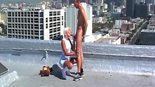 Blonde MILF Squirts While Riding Cock on Rooftop