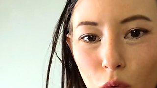 Small titted brunette Sharron with glasses masturbates