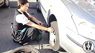 Dirndl Slut Gets Dirty and Oily Changing Tires