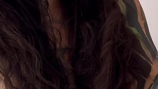 Tattooed Girl with a Split Tongue Smells Her Hairy Armpits After Working Out