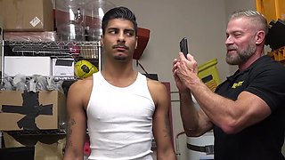 Tall bearded man with a great body catching a thief