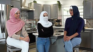 Shy Arab girl introduced to American cock by her two hijab girlfriends