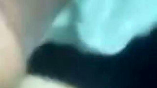 A Close-up of a Naked Pussy Is Spread Out by Her Hand and a Hot