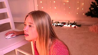 Blonde teen in solo action with her pussy