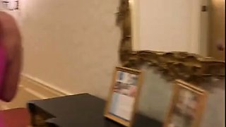 Big tittied MILF housewife posing in tight latex dress