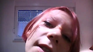 Redhead teen rubs and fingers her wet twat