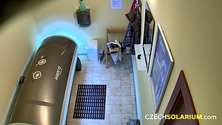 Czech Solarium 1: Brunette Peeling off for a Naughty Pussy Show
