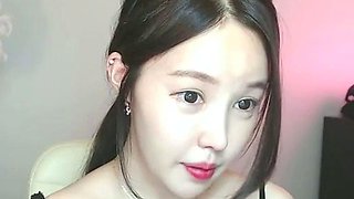 Busty Korean teen camgirl in pantyhose masturbates