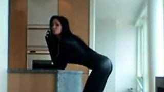 Smoking Hot Brunette Milf in Latex Catsuit and Boots