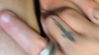 Watch this horny tattooed goth sliding fingers and dildo slow then harder and moaning loud