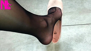 Dangling in Rose Ballet Flats in a Store
