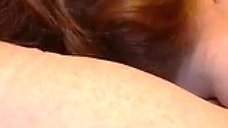 Mature Redhead Devours Throbbing Cocks in Sloppy Group Action