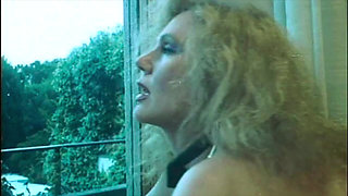 Marina Lotar in 2 Vintage Scenes: a Threesome and Doggy Style with Roberto Malone.