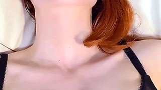 Strapon clad busty redheaded femdom babe toys pussy
