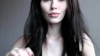 Russian brunette busty camgirl masturbating on webcam