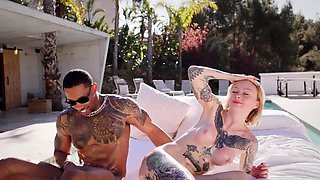 Tattooed MILF slut gives herself up to a gang of cocks