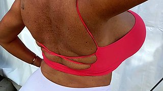 Blonde is flashing her big boobs in the outdoors