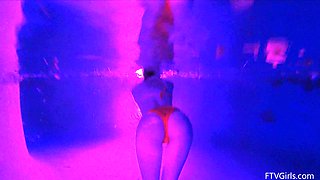 Natural tits brunette Lily swims in the pool and masturbates.