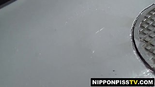 Japanese babes indulge in kinky outdoor piss fetish with twisted twist