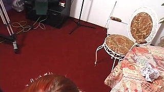 Amazing redhead blowing cock