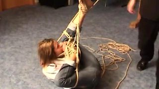 Tied up babe enjoys a slave fetish and being dominated