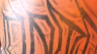 Latina Shakes Her Tattooed Butt