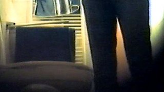 Girl using the toilet and filmed by voyeur 1