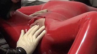 Hot MILF in a Red Latex Catsuit, Tie Me up and Make Me