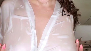 Beauty in a Wet Shirt Orgasms from Masturbation in Shower