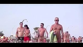 French nudist beach Cap d&#039;Agde people walking in nature&#039;s garb 02