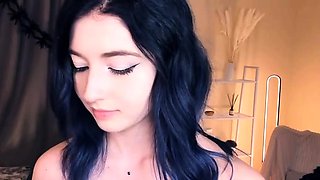 Busty babe playing with her big boobs