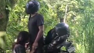 Bikers veer off the road for a quickie