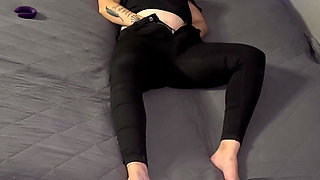 Blonde lady in black gets orgasms while standing behind the camera and watching her