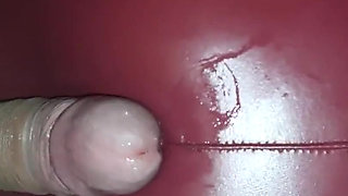 Gf's ass in red leather pants teasing my cock