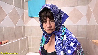 73 year old granny peeing at the bathtub