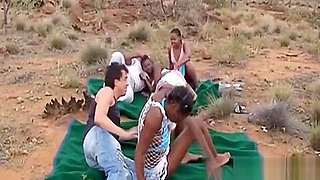Wild outdoor interracial group sex with hot African sluts and big cocked studs