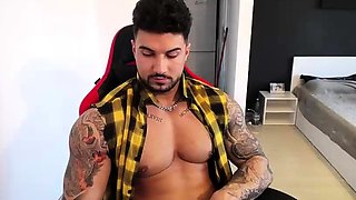 Hot gay with big muscles masturbates