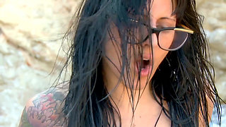 Great fuck on the beach for this sexy MILF wearing glasses