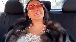Fur-coated stepmom gives stepson a blowjob in the car