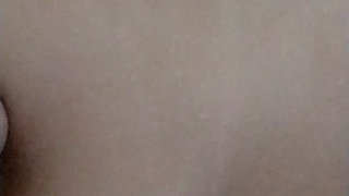 Staife in a shower and play with her breasts