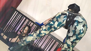 Latex Officer Fucks His Latex Prisoner with a Strap-on
