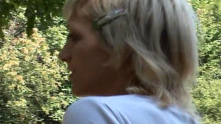 German Babe with Pierced Pussy Likes to Pee in the Forest