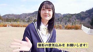 Pretty Asian teen in school uniform