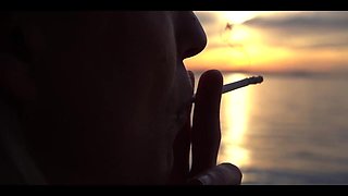 Smoking Cigarettes on the Beach... at Day and in Sunset.