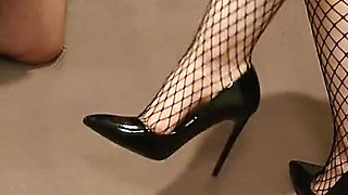 Ballbusting in fishnet stockings