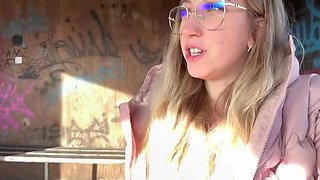 Blonde teen with nipple piercing masturbates at bus stop - German amateur solo