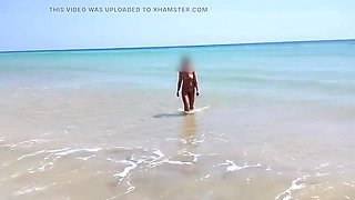 Nudist Beach Fun: Hot Girl Helps Guy Jerk Off in Public