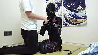 Mz08 - the Bound in Latex Suit Reaches Climax