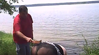 Angie Kimber gets spanked by lake dressed