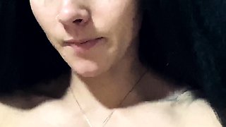 Busty curly brunette with big boobs fucks on couch
